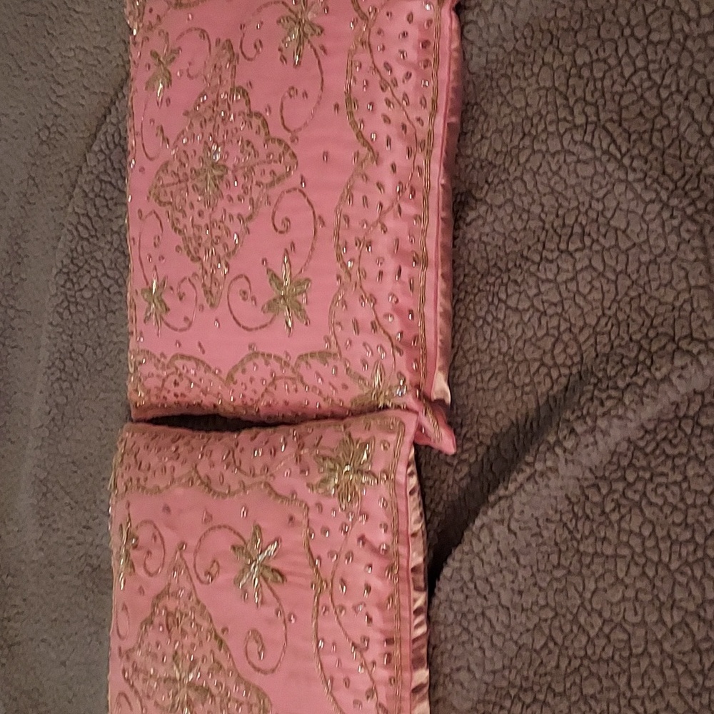 2 couch or bed pillow covers, pink with silver sequins. I bought from someone.